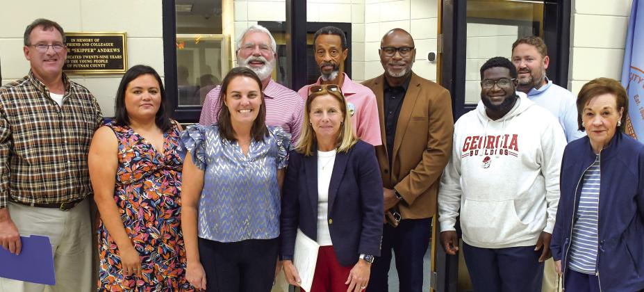 L-R: City Attorney Chris Huskins, City Clerk Maria Jiminez, Wards 1&amp;4 Councilor Marie Rainey, Mayor Pro-Tem Chip Walker, Ward 4 Councilor Teresa Doster, Ward 2 Councilor James Gorley, Wards 2&amp;3 Councilor Michael Smith, Ward 3 Councilor Fred Lowe, City Administrator Gary Sanders, and Ward 1 Councilor Mylle Mangum had the honor of holding the first official meeting in Eatonton’s new city hall last Tuesday evening. IAN TOCHER/Staff