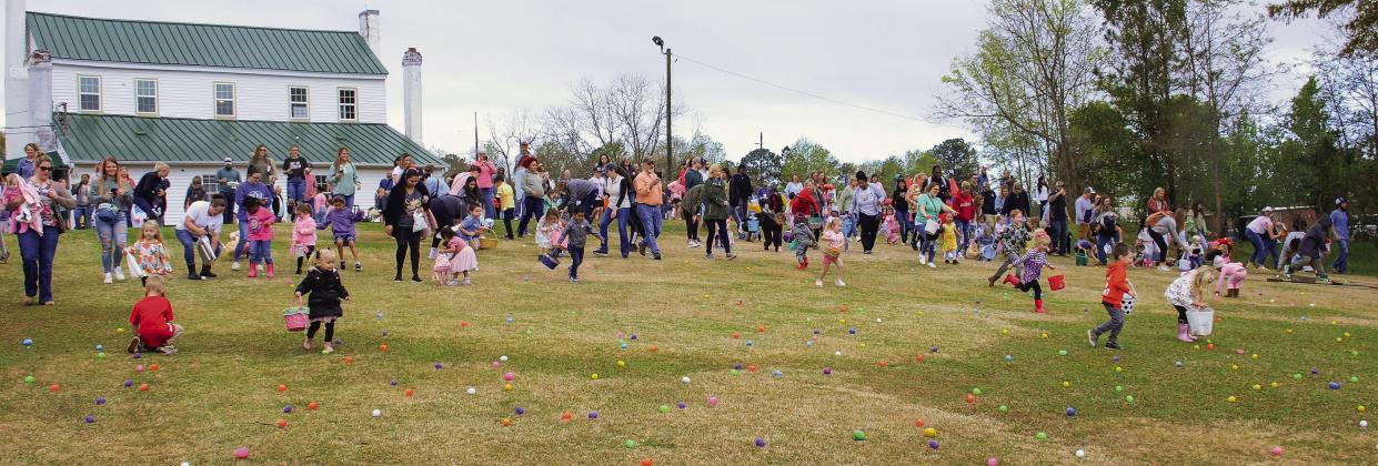 And they’re off! About 200 kids raced down the hill of the Uncle Remus Golf Course with a competitive spirit to guide them to grab each and every egg. IAN TOCHER/Staff