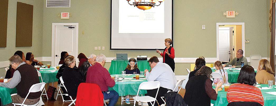 Several Putnam County citizens and representatives of local governmental and social assistance organizations were on hand as Rebekah Hudgins of the Georgia Family Connection Partnership gave her presentation. LENA HENSLEY/Staff