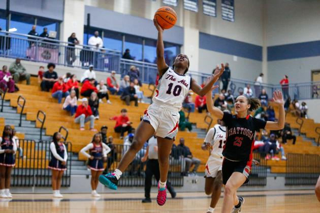 Journey Waller (10) goes up for a layup during a playoff game against Chattooga on Feb. 25. LANCE McCURLEY/Staff