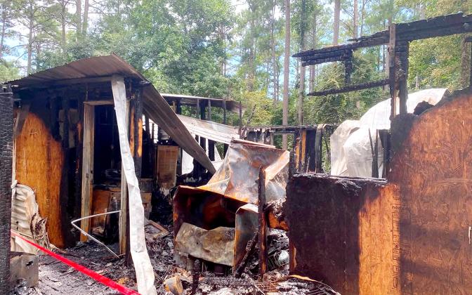 The mobile home on Sunset Drive is totally destroyed after a fire. The family’s pets perished in the fire. (Contributed photo)