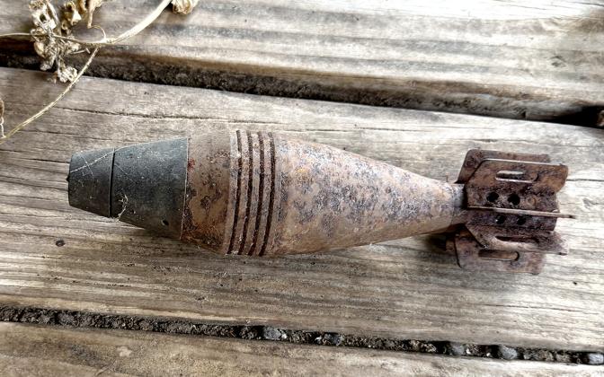 Photo cutline: One of two mortar rounds that were discovered on hoarded property on Clubhouse Road.  (CONTRIBUTED/SHERIFF SILLS)