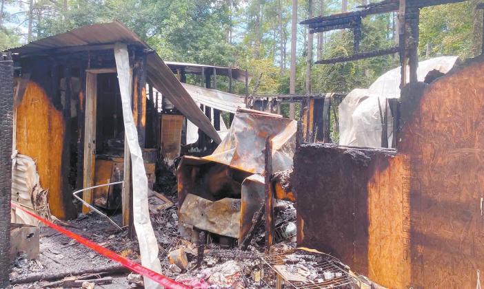 The mobile home on Sunset Drive is totally destroyed after a fire. The family’s pets perished in the fire. CONTRIBUTED