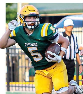 Gatewood running back Brady Haley runs downfield behind his blockers during a scrimmage against Edmund Burke Academy on July 31. TREY NORRIS/Staff