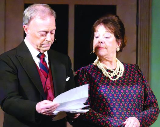 Veteran stage actors Michael Homeier as Sir Lawrence Wargrave and Rusty Faulk as Emily Brent share a reflective moment on stage during LCP’s production of And Then There Were None.LEIGH LOFGREN/Staff