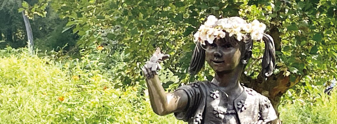 The hackberry emperor butterfly poses atop the sculpture’s butterfly, where it remained for photos. VIRGINIA LINCH/Contributed