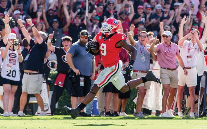 Georgia linebacker Chris Cole returns an Oklahoma fumble 85 yards for a touchdown. SKYLA MORRIS/Staff