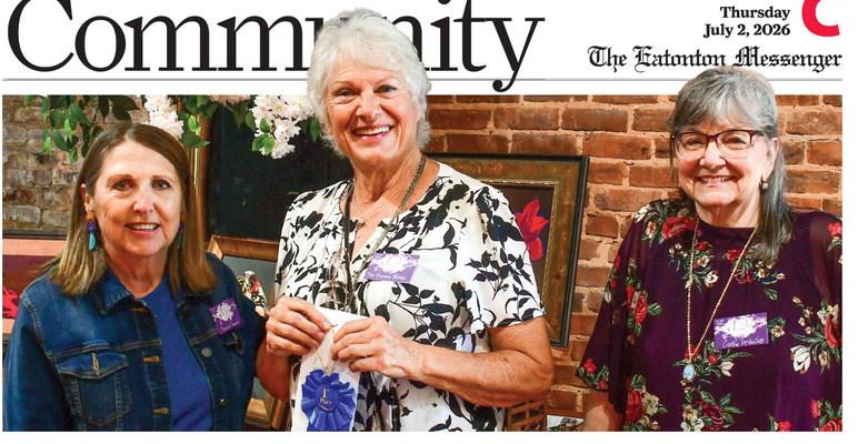 Artist Pat Devine Barnes (center) accepted the blue ribbon, signifying her first-place finish in the 10th annual Lake Country Juried Art Show, from show cochairs Michele Hartung (left) and Cathy McIntire.