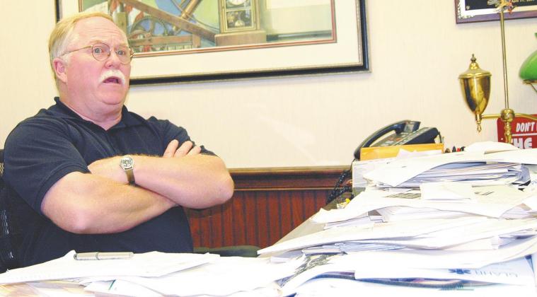 Putnam County Sheriff Howard Sills – seated at his desk during the Dermond investigation in 2014 – said he believes the Dermonds knew the people who took their lives. FILE PHOTO