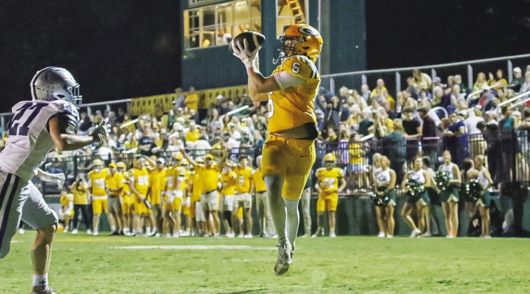 Drew Love catches a pass for a touchdown in Gatewood’s annual “Gold Out” game in support of Childhood Cancer Awareness Month. TREY NORRIS//Staff