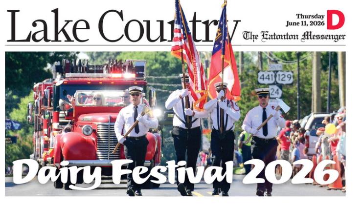 Members of the Eatonton Fire Department, including Fire Chief Jamey Williamson driving the department’s vintage fire truck were near the head of the parade through downtown streets.
