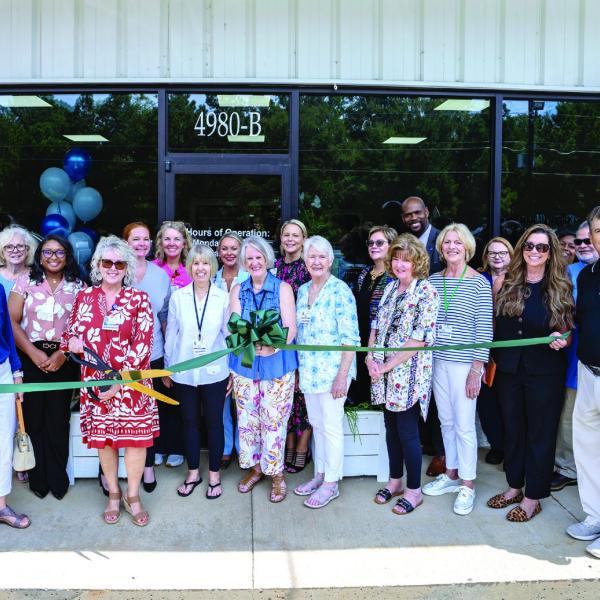 St. Mary's Retail Operations Manager Angie Patterson prepares to cut the ribbon to open St. Mary's Good Samaritan Hospital Upscale Thrift Store in 2025. Photo courtesy of Brock Company Creative CONTRIBUTED