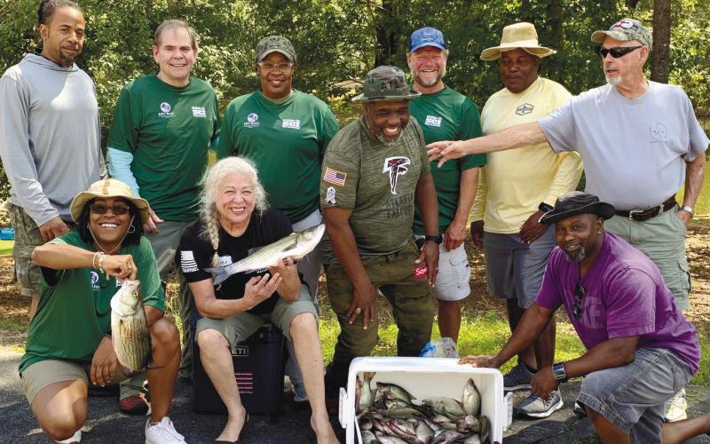 Various U.S military veterans pose with fish caught during last month’s “Cast and Blast” event on Lake Oconee. CONTRIBUTED