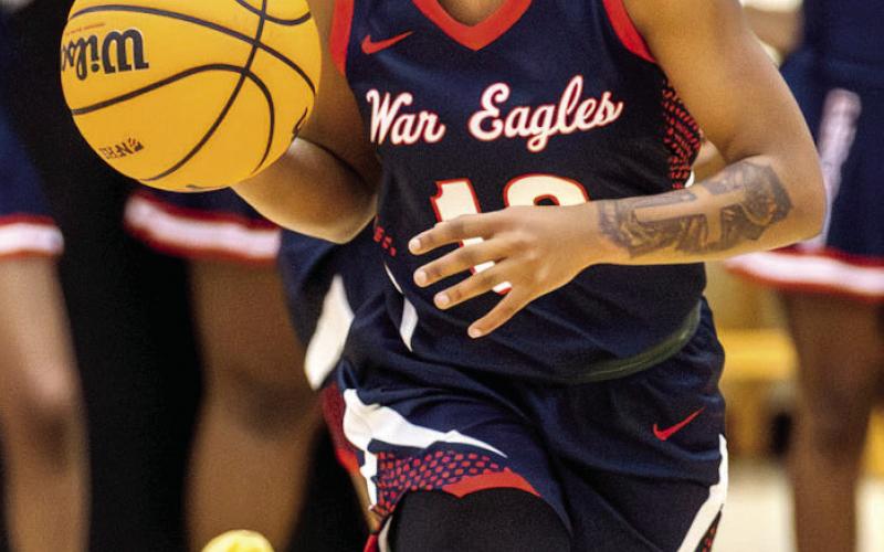 Putnam County girls junior point guard Journey Waller pushes the ball up the floor in transition. LANCE McCURLEY/Staff