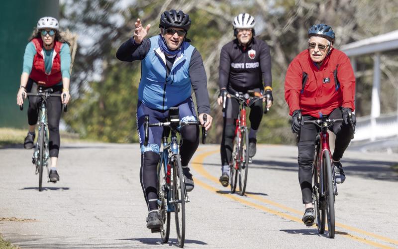 More happy cyclists come to the end of their ride. LEIGH LOFGREN/Staff