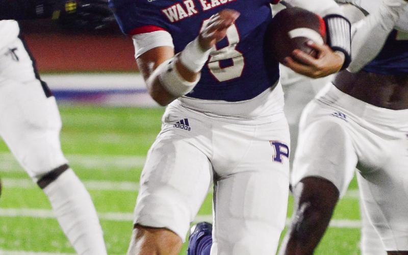 Quarterback Brannan Griffin (8) scored twice for the War Eagles and performed well all night in leading the War Eagles to a big 48-14 win over Towers. IAN TOCHER/Staff