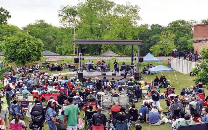 A sizable crowd grew steadily as the day wore on Saturday for the “Peg Leg” Howell BBQ &amp;amp; Blues Festival at City Center Stage in downtown Eatonton. GORDON COLUMBINE/Staff