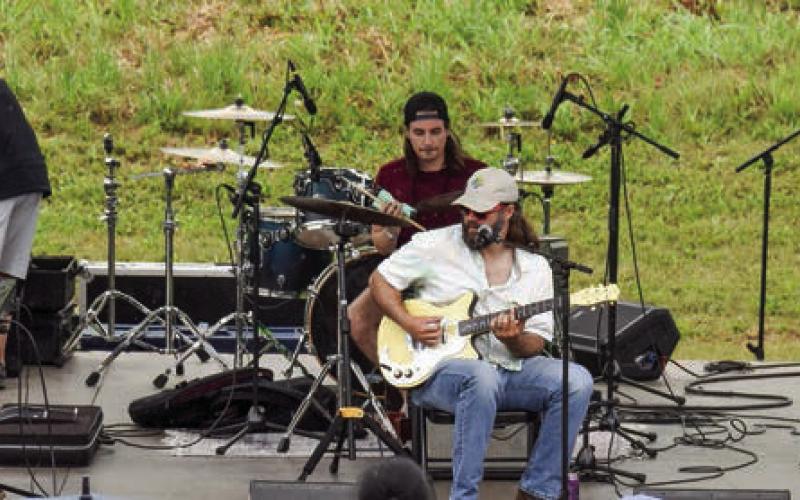The guys in Roofdog opened the live entertainment Saturday afternoon at Eatonton’s City Center Stage. GORDON COLUMBINE/Staff