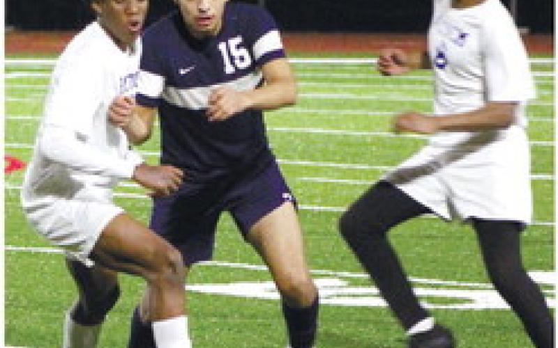 Sophomore Emmanuel Meraz (15) battles for possession of the ball. KIM CASH/Staff