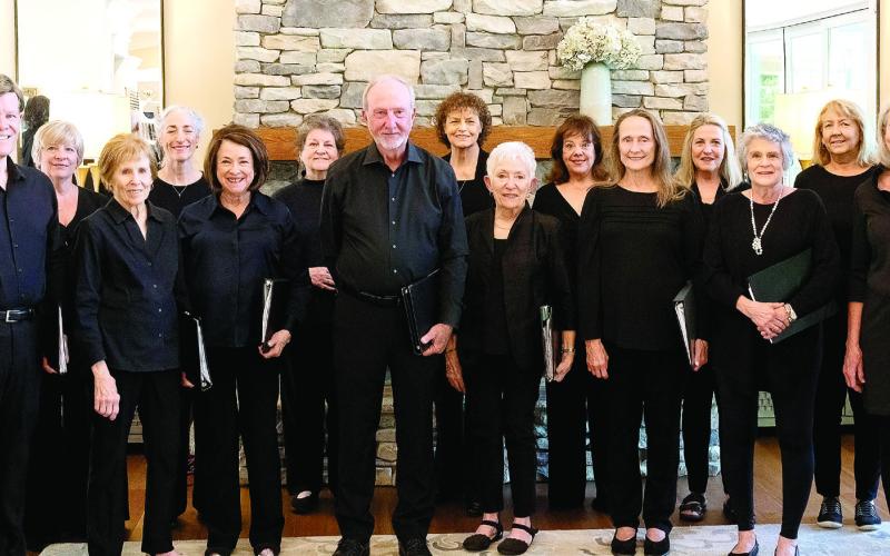 Members of the East Georgia Concert Chorale include (back row, l-r): Joe Williams, Hal Meeks, Jana Williams, Suzanne Vest, Carol Grant, Linda Hammett, Sandy Williamson, Rusty Faulk, Donna Valvo, Margie Heimer, Norris McElroy, and Dave Heimer, with (front row, l-r): Bruce Angier, Tom Bantly, Jenny Moore, Carol Gracko, Brian Williams, Katie Price, Brenda Austin, Karinne Fish, Cindy Coker, Lewis Hammett, Frank Casara. Not pictured are Rosie Herrmann, Drace Langford, and Tom Balestreire. LEIGH LOFGREN/Staff