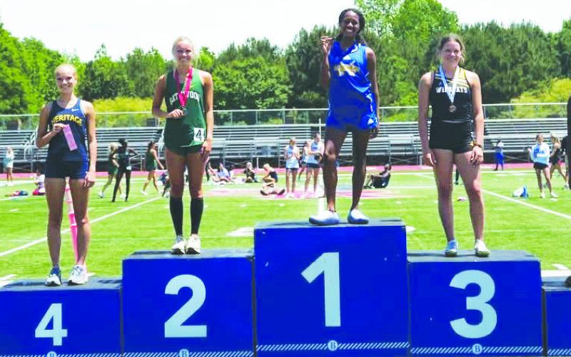 The Lady Gators piled up the points in the May 2 Class AA state meet, enough to propel the team to third place. CONTRIBUTED