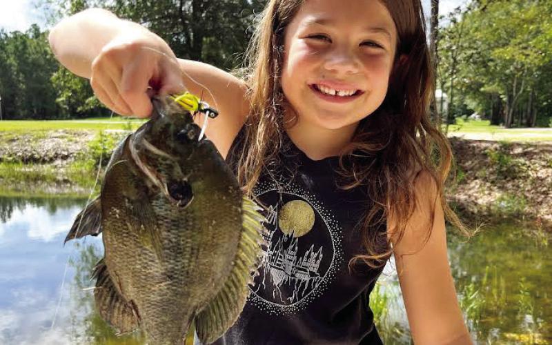 Young anglers are encouraged to document their catches to receive official state recognition of their fishing accomplishments. CONTRIBUTED