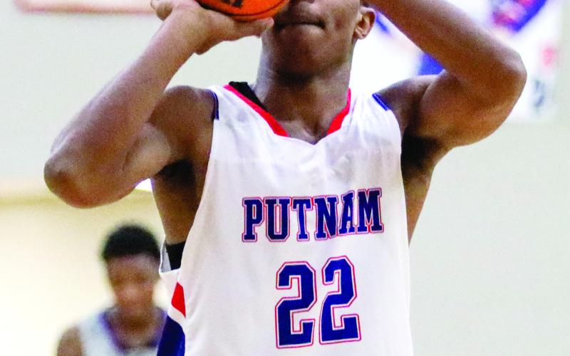 Bryce Brabham (22) played a pivotal role in Putnam County’s revenge win over Washington County last week. LANCE McCURLEY/Staff