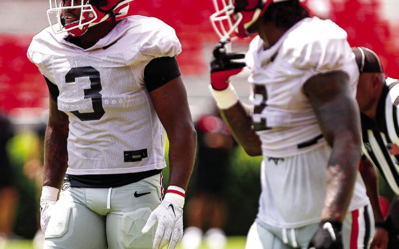 Linebackers CJ Allen (3) and Smael Mondon during Georgia’s preseason scrimmage Aug. 17. Tony Walsh/UGAAA