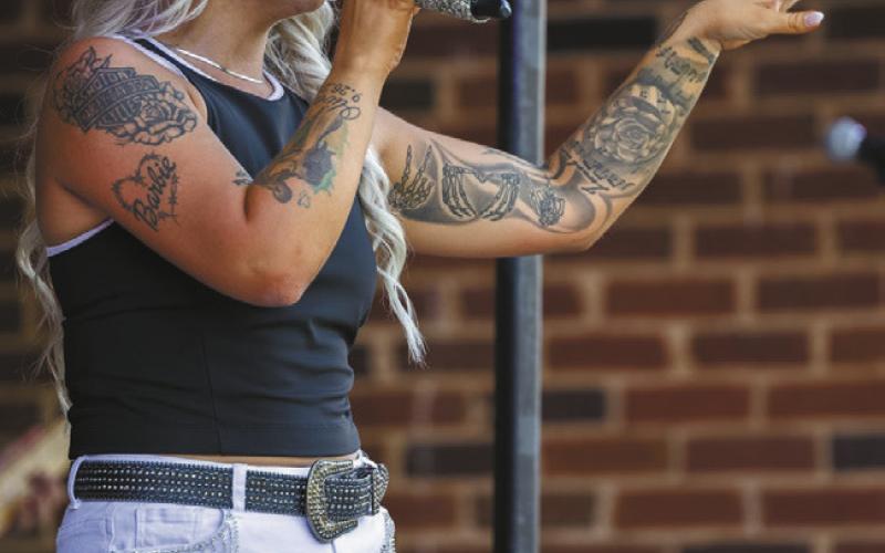 Amy Rae and her Atlantabased, countryrock band kept the Taste of Eatonton crowd up and dancing with a couple of rousing sets from The Plaza’s outdoor stage beyond its front doors. CONTRIBUTED