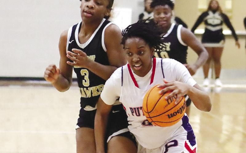 Kamyra Aikens (21) takes it to the basket against Washington County. ARELLA CASH/Staff