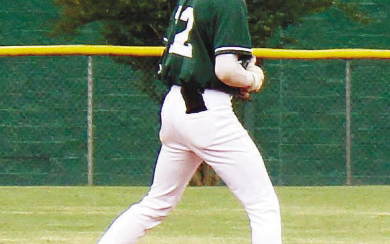 An emotional John Wallace Thompson (12) cheers on his Gatewood teammates while standing on second base. TREY NORRIS/Staff