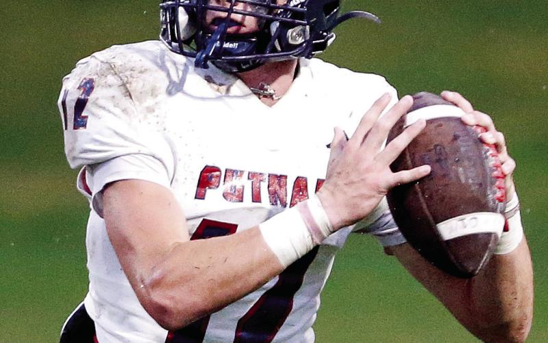 Putnam County senior quarterback Ethan Whatley led the offense down the field against Haralson County with under a minute left, setting up the game-winning score from Jayson Smith. LANCE McCURLEY/Staff