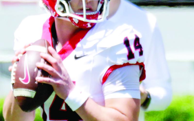 Gunner Stockton looks downfield to pass during G-Day. BRAD HARRISON/Staff
