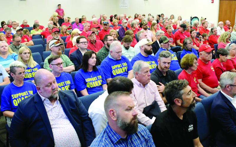 Not quite a sea of red as quarry proponents adopted blue as their sign of support, but in the end, the Putnam County Planning &amp;amp; Zoning Board voted to recommend denial of approval by the County Commission for Putnam County Stone to go forward with its plans alongside Dennis Station Road, near Interfor. IAN TOCHER/Staff