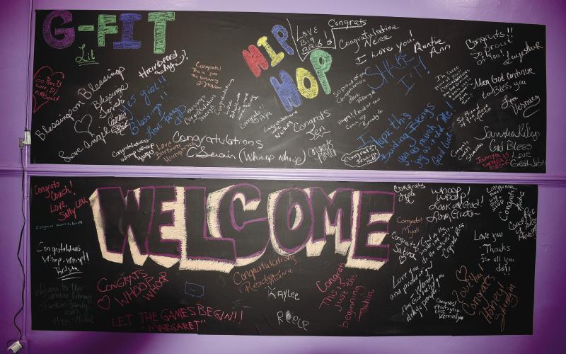 Pretty Girlz Fitness features a mural that represents the community and welcomes new members.