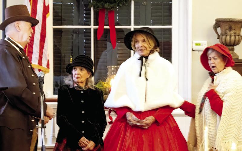 Londoners Verley Dotson, Joan Stevens, and Gail Kavanaugh perform in “Christmas, Bah Humbug No More!” in The First Presbyterian Church in Greensboro. LEIGH LOFGREN/Staff