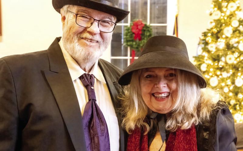 Steve and Pamela Stewart dress in time period attire to perform. LEIGH LOFGREN/ Staff