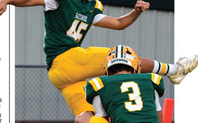 After a great snap from Cayden Burner and perfect placement by Harrison Harper (3), freshman kicker Ruben Sanchez (45) came through last Friday with the extra point for a last-second tie that sent the Gators into overtime. IAN TOCHER/File photo