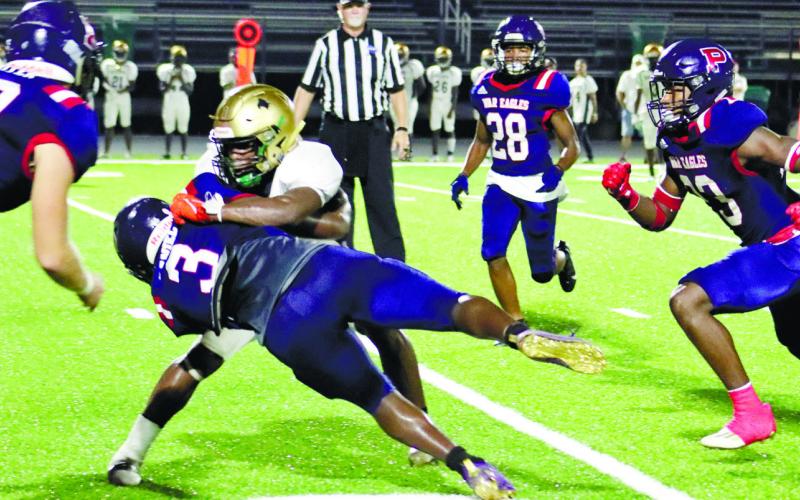 Putnam head coach Shaun Pope praised Rashod Daniel (3) for his play on both sides of the ball last Friday in the War Eagles’ win over Butler. ARELLA CASH/Staff