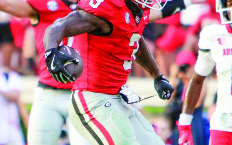 Georgia running back Nate Frazier (3) scored two touchdowns against Austin Peay last Saturday. LANCE McCURLEY/Staff