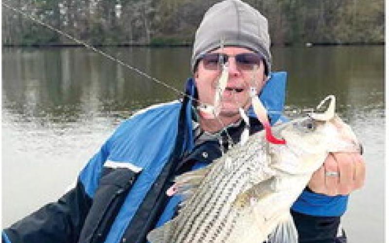 Kevin Wahl with a Lake Sinclair Striper caught trolling a mini Mack. CONTRIBUTED