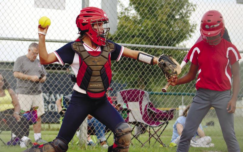 Lily Frisch gets some time behind the plate against the Lainey team.