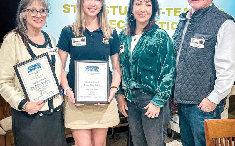 Gatewood High School’s STAR Student Saige Nobis (left center) stands with her parents and chosen teacher Robin Allen-Peters (left). CONTRIBUTED
