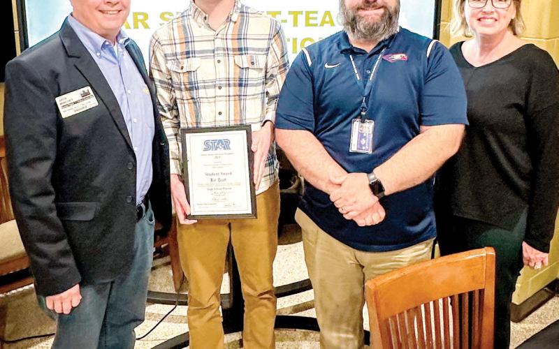 Putnam High School STAR Student Kai Trott (left center) stands with his chosen teacher William Bolllen. CONTRIBUTED