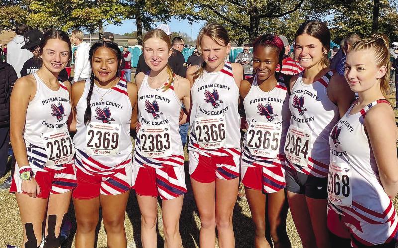 The Lady War Eagles pose for a picture Nov. 4 before the start of the Class AA cross-country race in Carrollton. CONTRIBUTED