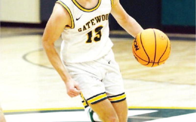 Kaiden Keiser (13), son of Gators head coach Don Keiser, consistently moves the ball well on up-court rushes. IAN TOCHER/Staff