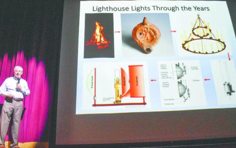 Dr. William Rawlings discusses lighthouse lights over the years. ILENA HENSLEY/Staff