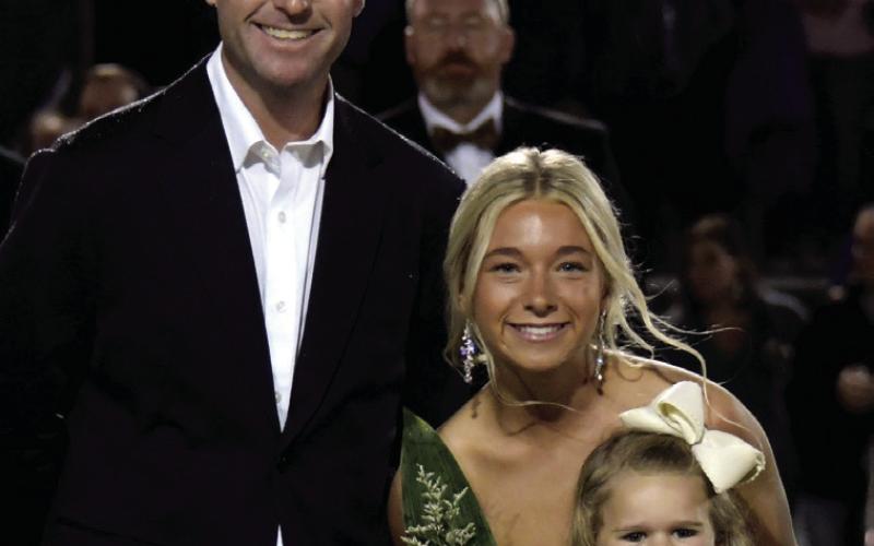 Lily Piper, daughter of Michael and Jessica Piper, was accompanied by her father and K-5 buddy Francis Jane Self.