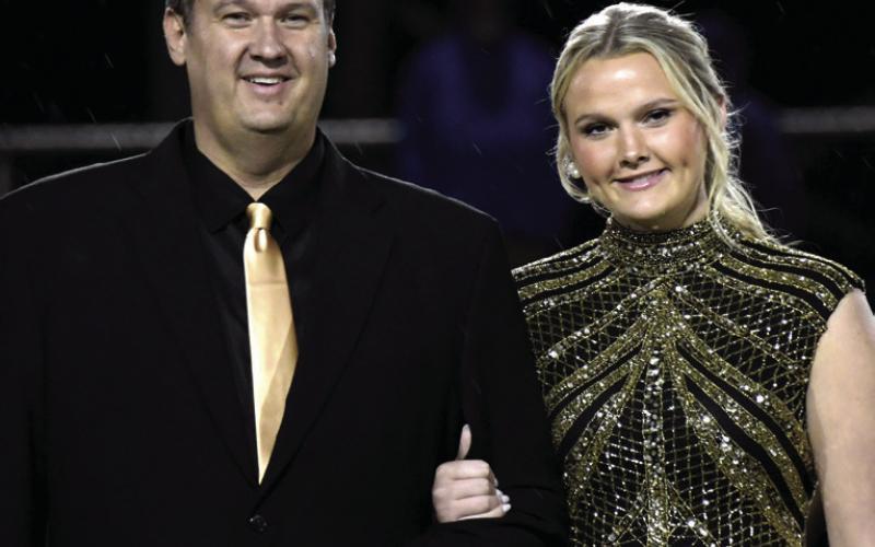 Willow Davis, daughter of Keith and Callie Davis, was escorted by her dad.