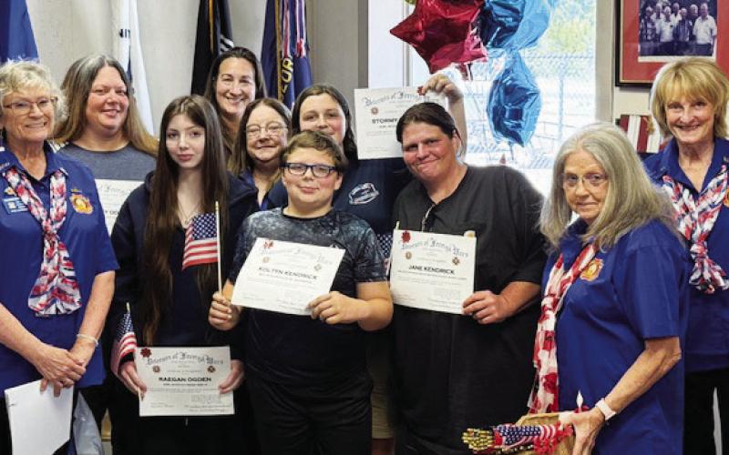 Members of Girl Scout Troop 60516 were joined by a young man from Boy Scout Pack 34 at the VFW event last weekend in Eatonton. CONTRIBUTED
